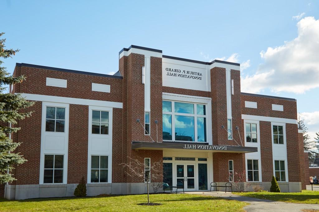 Exterior shot of Innovation Hall, a brick building with windows