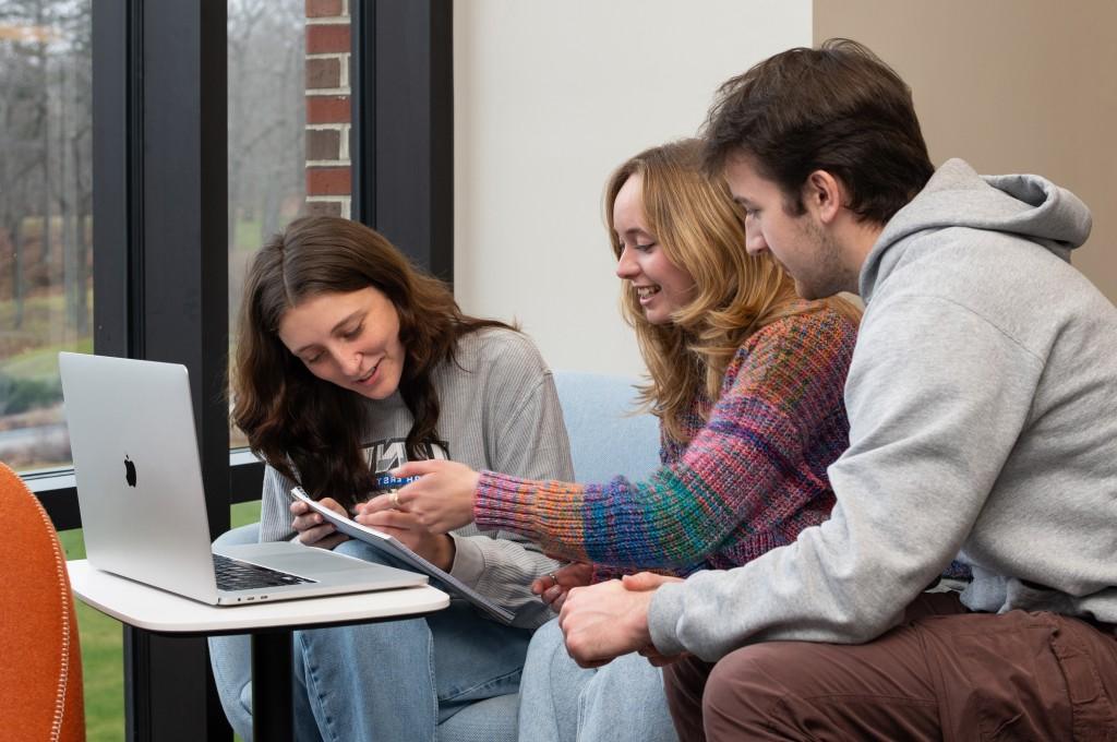 three students working together